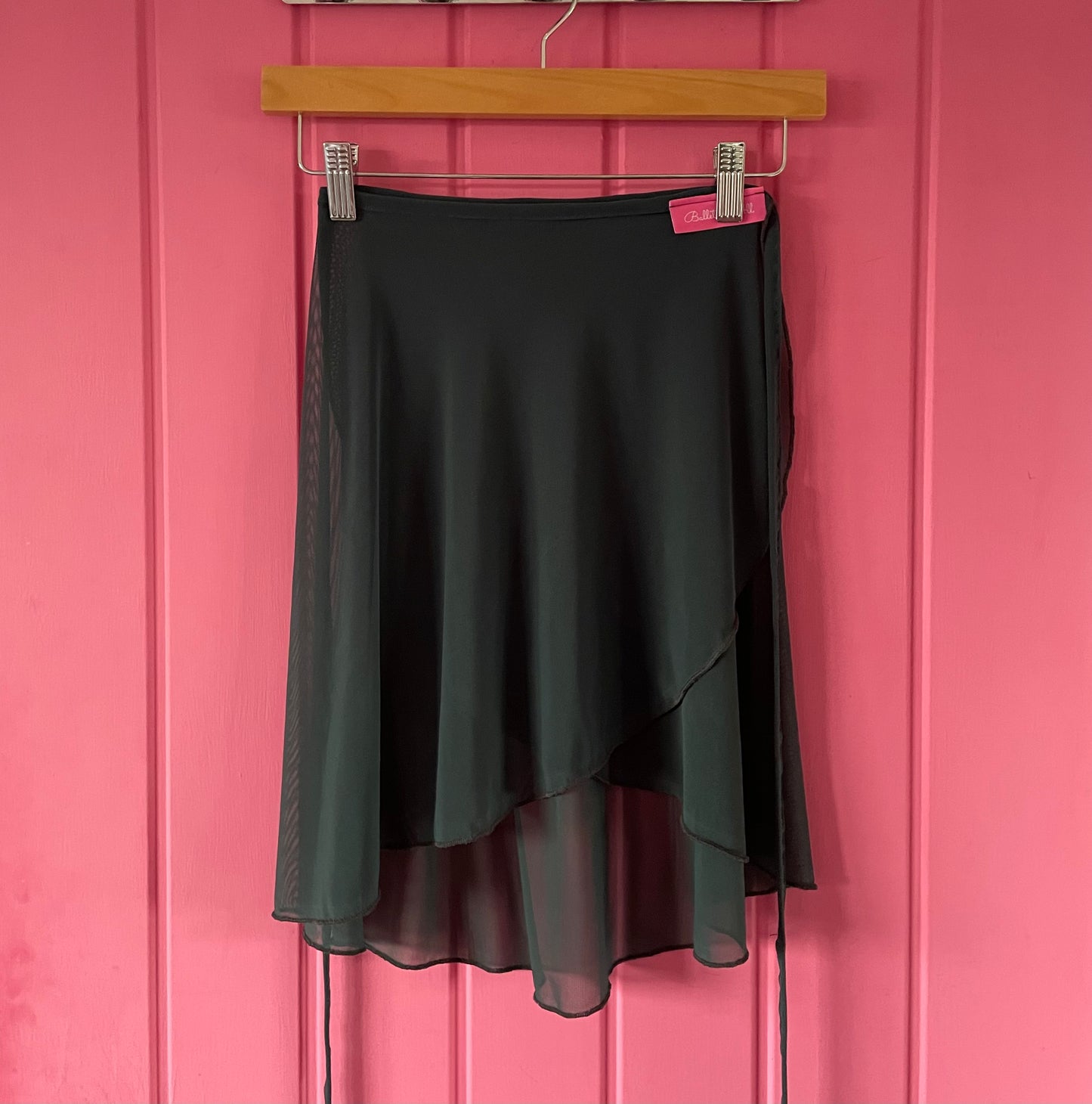 Charcoal Grey colour skirts with a sheer overlay on a pink background