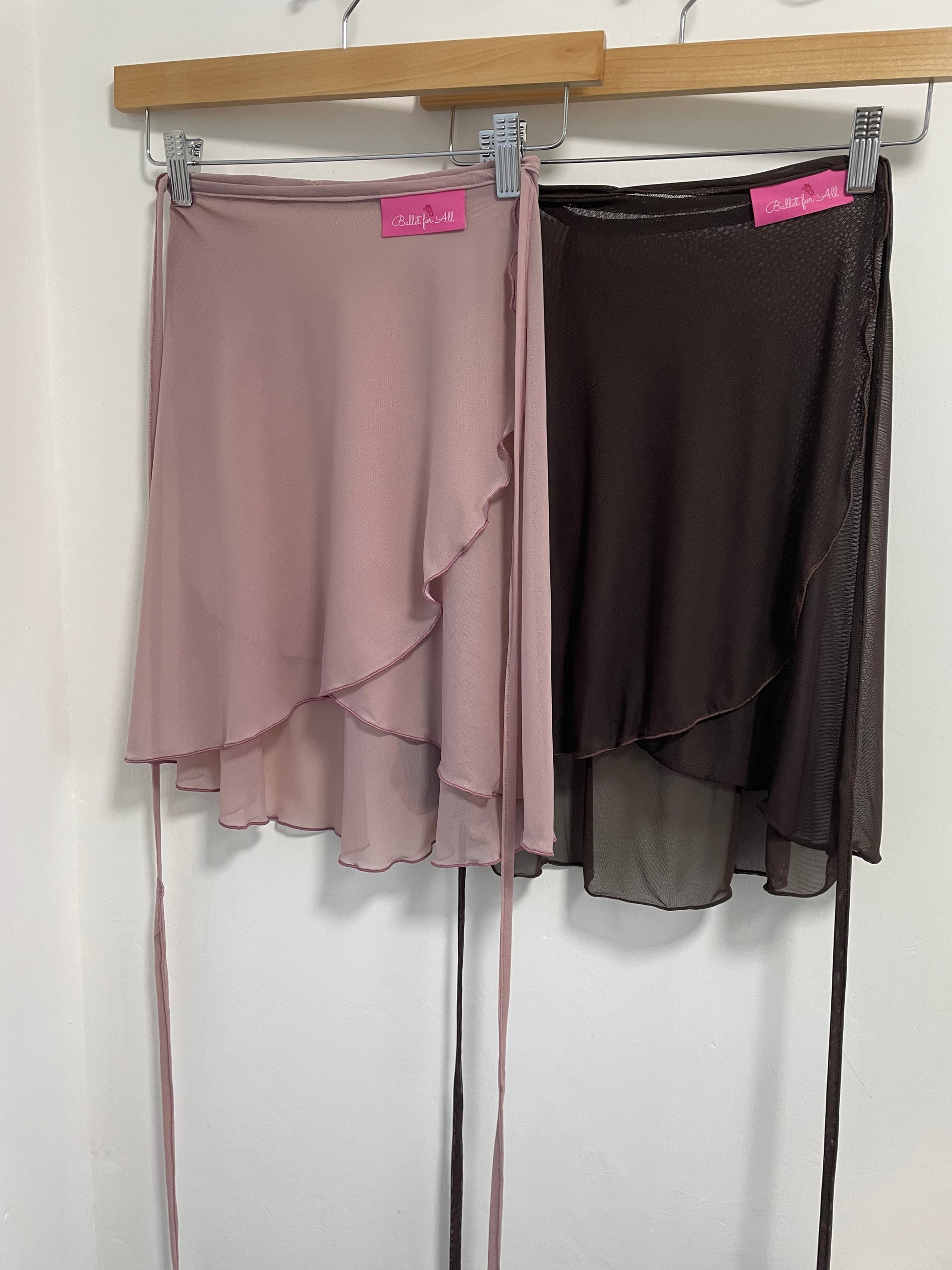 Heather & Chocolate colour skirts with a sheer overlay on a white background